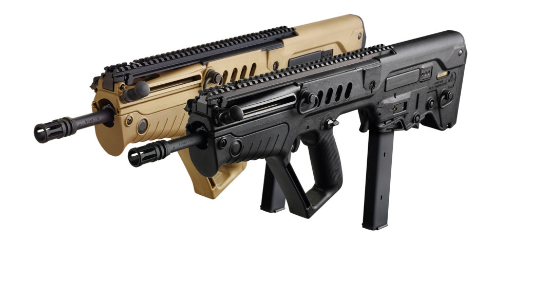 Picture of two Tavor rifles in 9x19mm. ONe of the rifles is cyote tan and the other is black.